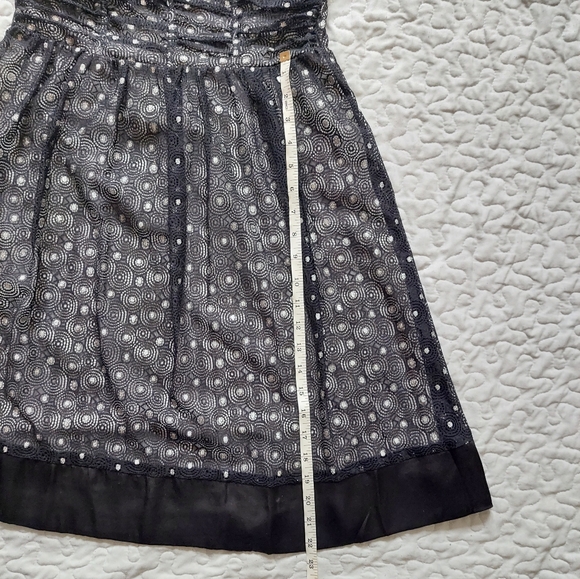 Strapless black and silver lace dress with ruffle and ribbon details - Picture 3 of 7